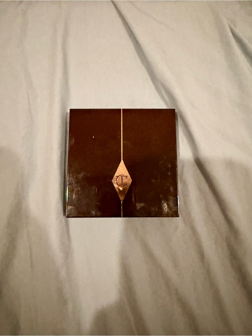 Charlotte Tilbury Brown Compact with Rose Gold Logo Accent